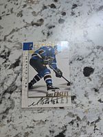 Front of Pinnacle card showing Mike Eagles in action and autograph