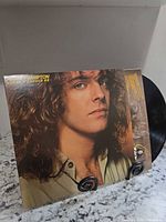 Front cover and record partially visible