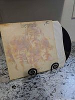 Front of album jacket showing Bread title and portrait artwork, vinyl partially visible