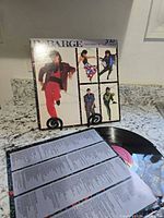 Front jacket and record with lyric sleeve visible