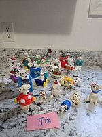 Group view of all dalmatian figures and vehicles on countertop