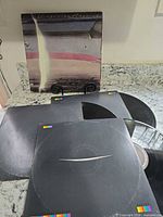 Front cover on stand, partial shrink intact