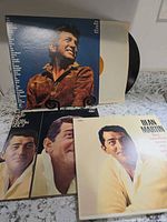 Front covers of all three Dean Martin albums displayed with one record partially visible.