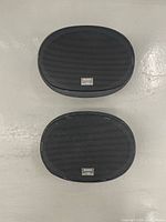 Front view of two speakers with Sony grilles attached