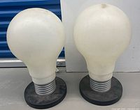 Front view of both oversized bulb lamps on bases