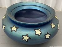 Top angled view showing vase shape and star design