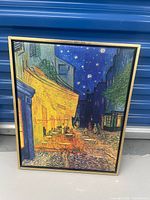 Front view of framed Van Gogh Café Terrace at Night canvas print