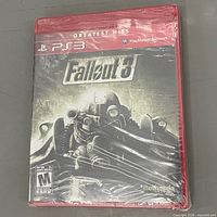 Front view of sealed Fallout 3 PS3 game case showing title and shrink-wrap