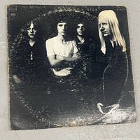 Front sleeve showing Johnny Winter And cover art and wear