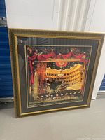 Full view of framed print showing opera house scene