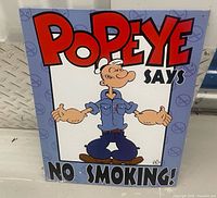 Front view of Popeye No Smoking metal sign