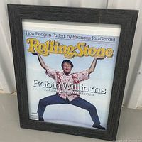 Front view showing Rolling Stone cover and frame details