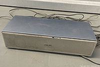 Front/top view of Sony SS-CN125 center speaker showing grille and logo