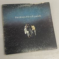 Front jacket showing album title and wear