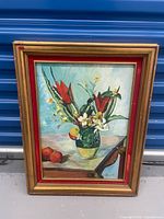Front view of framed canvas showing the floral still life and full frame