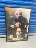 Front view of framed Three Stooges poster