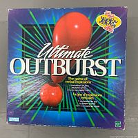 Front of Ultimate Outburst box shows title graphics and Parker Brothers logo