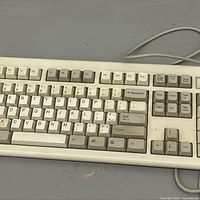 Top view of beige 101-key keyboard showing key layout and two-tone keycaps