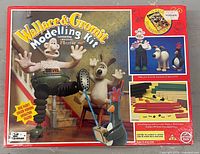 Front of retail box showing Wallace & Gromit Modelling Kit graphics and age recommendation