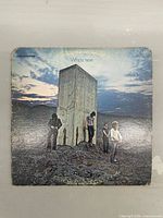 Front sleeve with artwork and wear visible