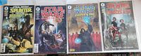 Four bagged Star Wars comics side by side