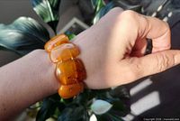 Bracelet worn on wrist showing bead size and colour