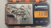 All silver items on scale reading 11.78 g