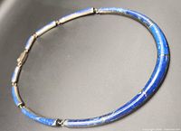 Full view of hinged lapis lazuli and silver collar necklace