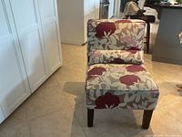 Front view of floral slipper chair