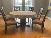 Table with 6-ft top installed, surrounded by six chairs