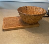 Zebra wood bowl sitting on Sabatier cutting board