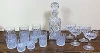 Full set showing decanter, tumblers and coupes