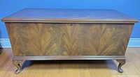 Front view of mahogany/cherry veneer cedar blanket chest on Queen Anne legs