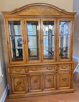 Front view showing full china cabinet with doors closed