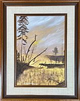 Full view of framed landscape painting