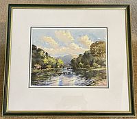 Full framed painting showing mat and frame