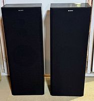 Front view of both speakers with grilles