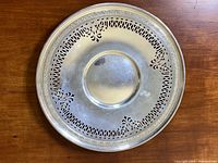 Round pierced tray front view