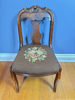 Front view of Victorian side chair showing overall design and needlepoint seat