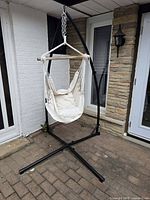 Full view of hammock chair hanging on stand