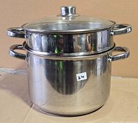 stock pot with steamer insert and lid assembled