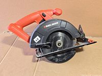 Left side profile showing overall saw design