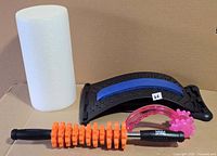 Group shot of all four massage tools