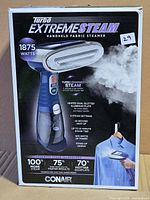 Front of box showing full image of steamer and key specifications