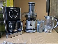 Overall view of juicer, coffee maker, kettle and pitcher