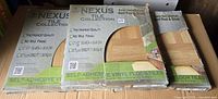 Three sealed boxes of Nexus Tile Collection self-adhesive vinyl floor tiles