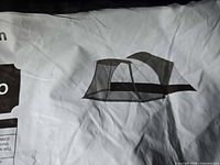 Printed label showing outline graphic of tent with screened section