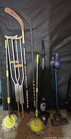 Full lot: crutches, hockey sticks, spin mops, steam mop, cordless vacuum, ankle weights