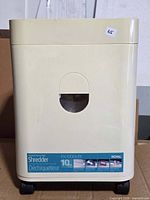 Front view of Royal PX1000MX shredder on casters with viewing window and product label