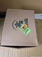 Closed Kamik shoe box exterior